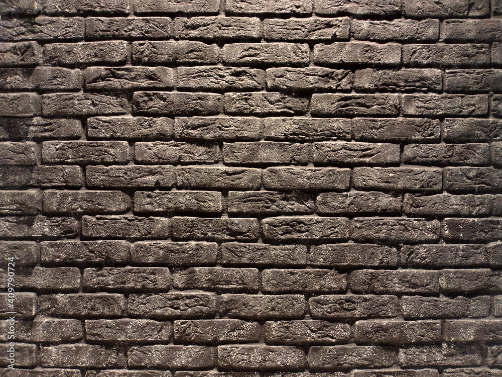 an old brick wall texture background, light glare