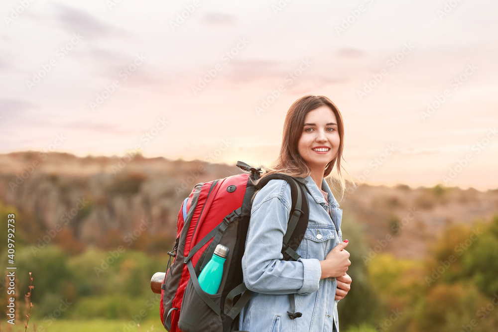 Young female tourist in countryside
