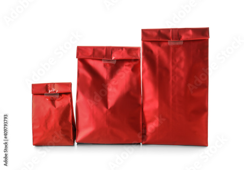 Blank paper bags on white background