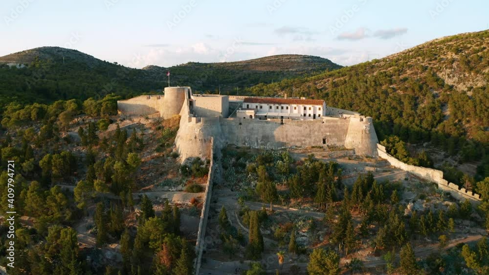 Aerial view of Spanish Fortress at Hvar at sunset. Hvar island, Croatia Aerial view of Spanish Fortress at Hvar at sunset. Hvar island, Croatia