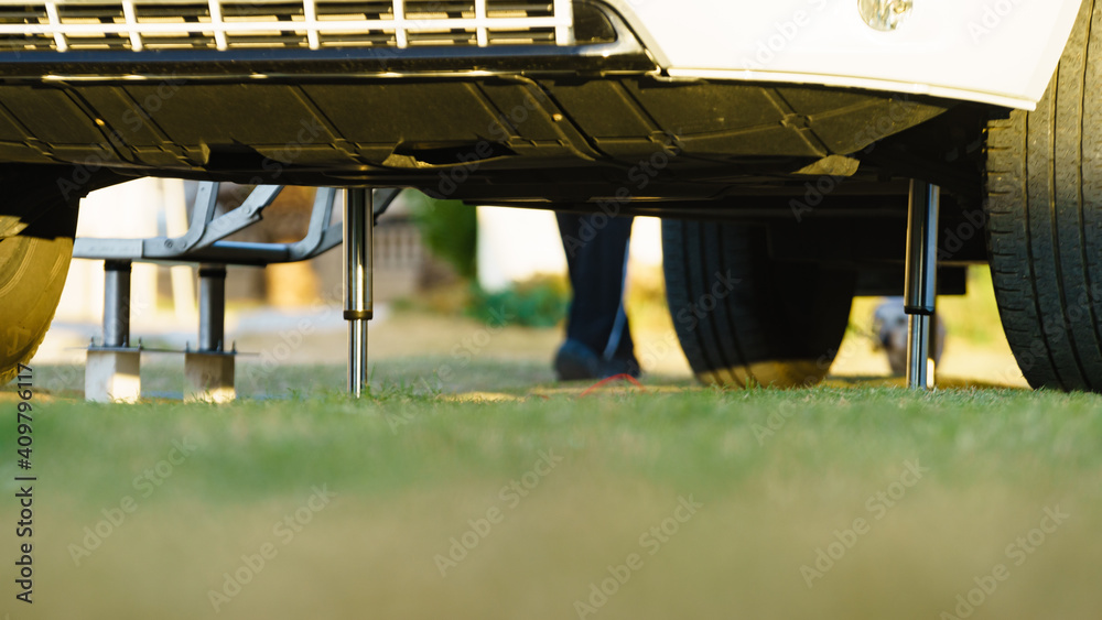 Camper leveling support leg in use. Stock Photo Adobe Stock