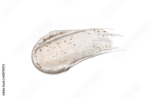 Cream scrub isolated on white.