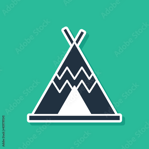 Blue Traditional indian teepee or wigwam icon isolated on green background. Indian tent. Vector.