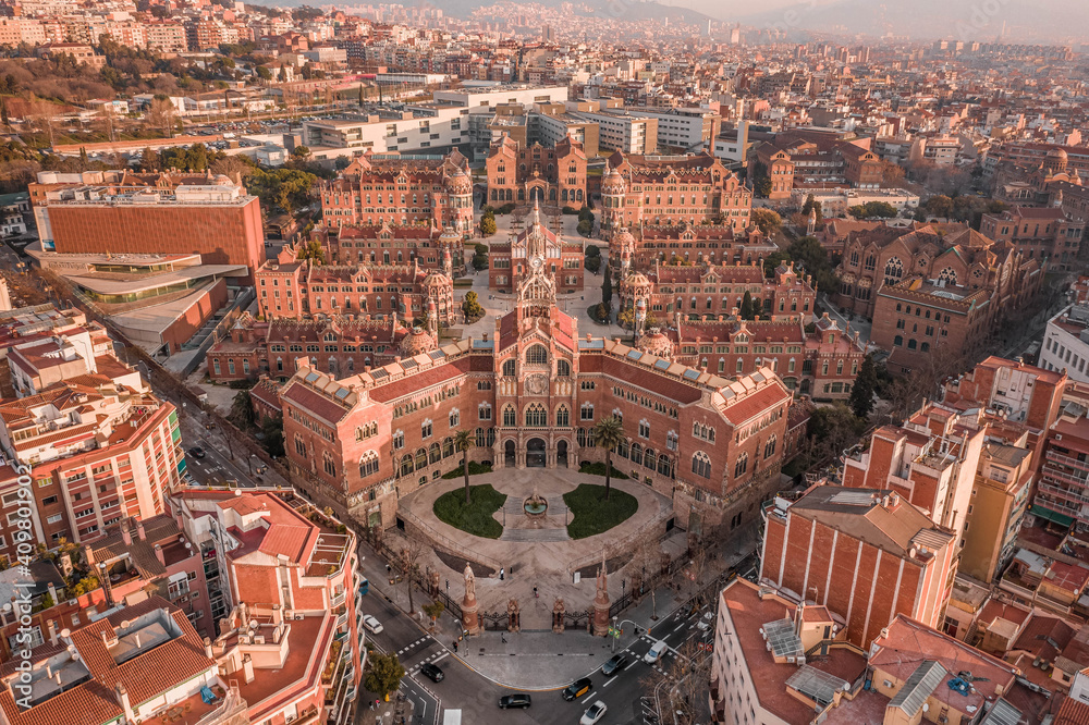 Fototapeta premium Aerial drone shot of Barcelona near Turo de la Rovira in morning sunrise