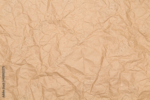 Crumpled brown wrapping paper. Texture and background.