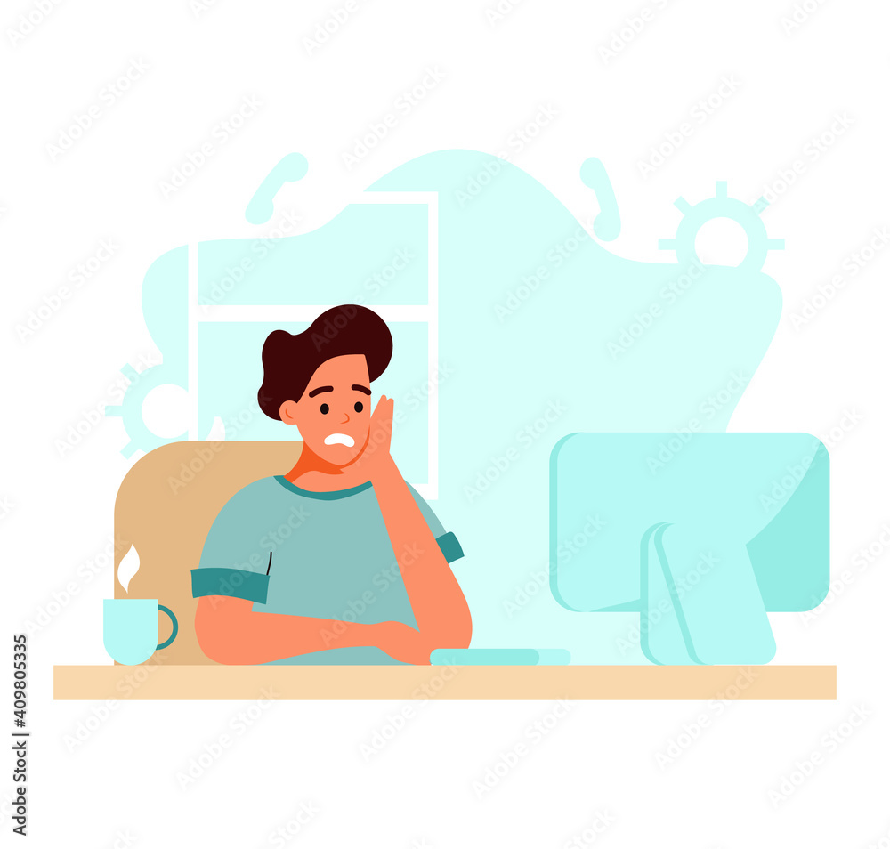 Obraz premium sad and puzzled man at work sitting at the computer, the man leaned his head on his hand, difficult work