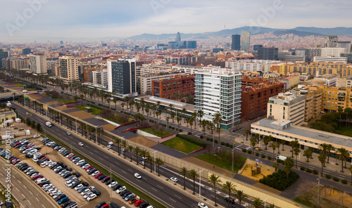 Aerial view of Barcelona cityscape on Mediterranean coastline
