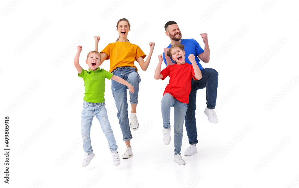 Excited family celebrating victory together in studio Excited family celebrating victory together in studio