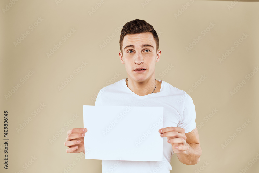 man holding white sheet of paper in hand billboard copy space office man holding white sheet of paper in hand billboard copy space office
