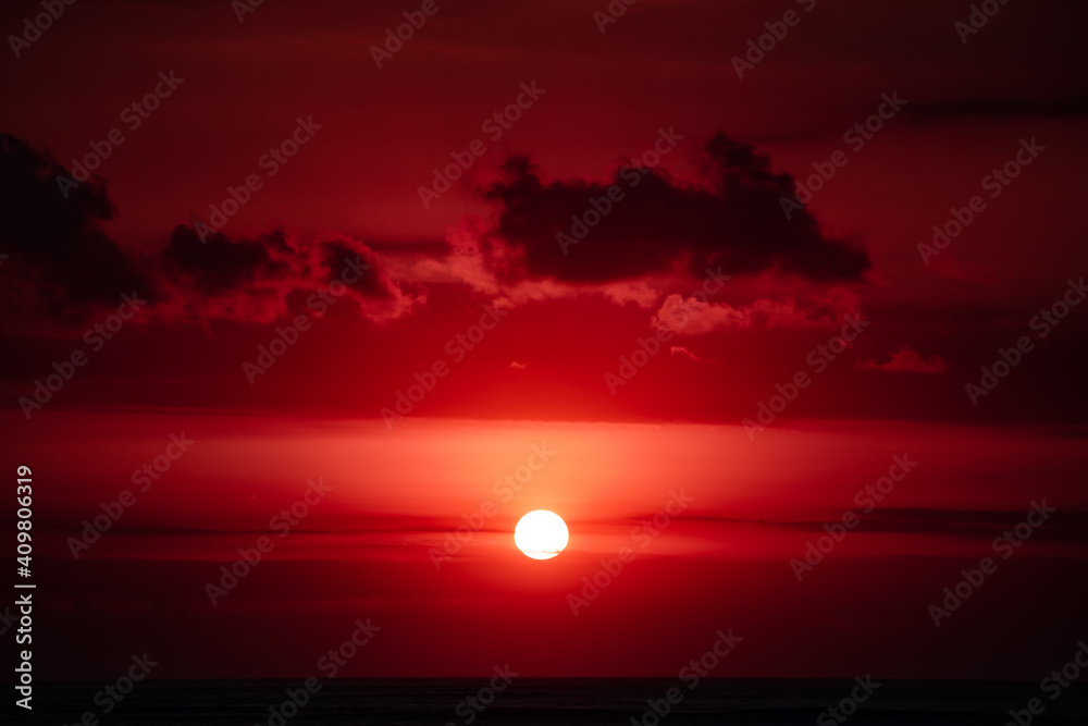 Sunrise / sunset over the ocean and horizon in golden colors. Sunrise / sunset over the ocean and horizon in golden colors.