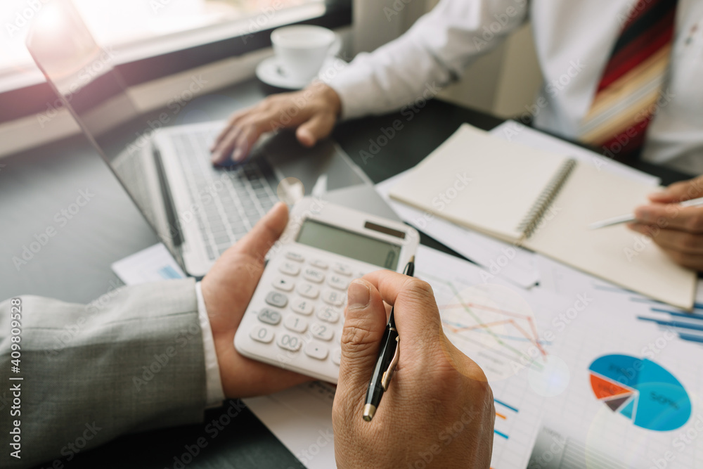 Brainstorming meeting of businessmen working together to come up with a marketing strategy Business finance and accounting concepts Brainstorming meeting of businessmen working together to come up with a marketing strategy Business finance and accounting concepts