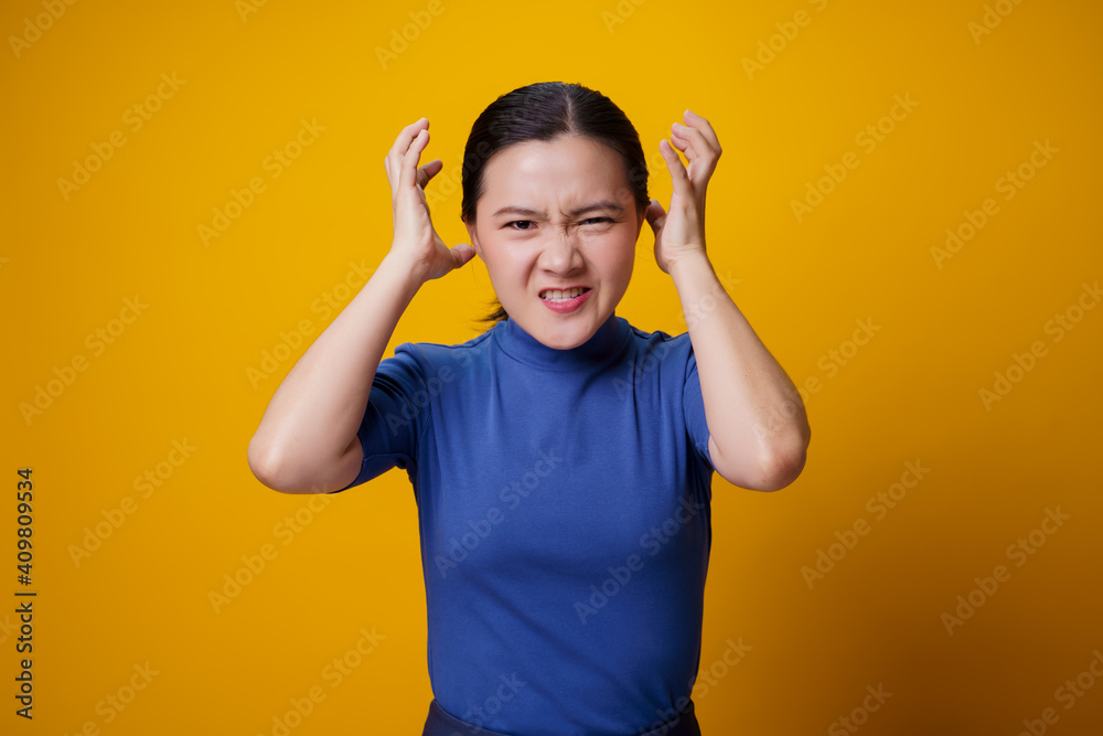 Asian woman standing and angry. Asian woman standing and angry.