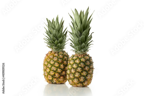 Tasty ripe pineapples isolated on white background © Atlas