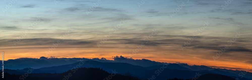 Sunset panorama on a winter evening in the Carpathian region