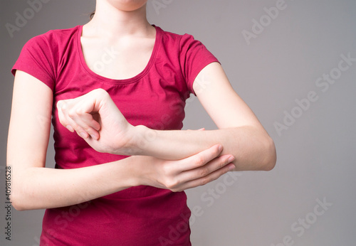 Tired woman feeling pain, massaging tense muscles