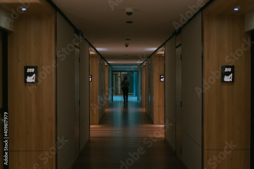 Hotel s corridor with someone in the middle