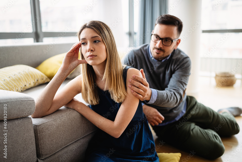 Unhappy couple having argument at home. Family, problem, quarell people concept. Unhappy couple having argument at home. Family, problem, quarell people concept.