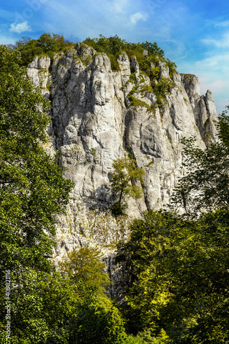 Fototapeta Naklejka Na Ścianę i Meble -  Sokolica mountain limestone peak in Bedkowska Valley within Jura Krakowsko-Czestochowska upland near Cracow in Lesser Poland
