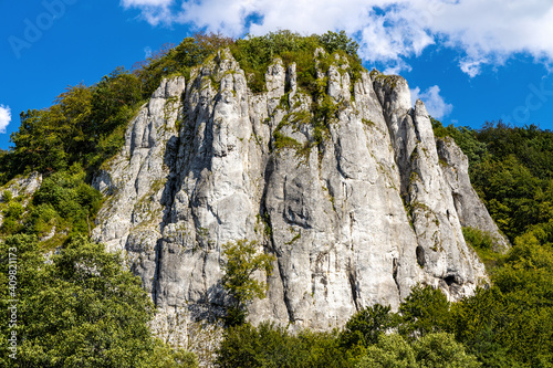 Fototapeta Naklejka Na Ścianę i Meble -  Sokolica mountain limestone peak in Bedkowska Valley within Jura Krakowsko-Czestochowska upland near Cracow in Lesser Poland