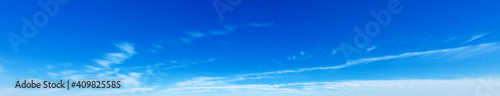 Fototapeta Naklejka Na Ścianę i Meble -  Blue Sky background with tiny Clouds. Panorama background