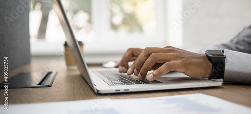 Man hands typing on computer keyboard closeup, businessman or student using laptop at office panoramic banner, online learning, internet marketing, working from home, home workplace freelance concept