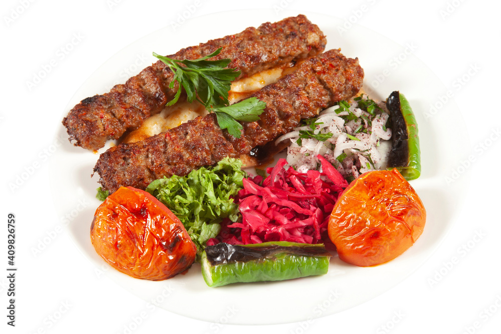 Traditional Turkish Adana Kebab and Salad Traditional Turkish Adana Kebab and Salad