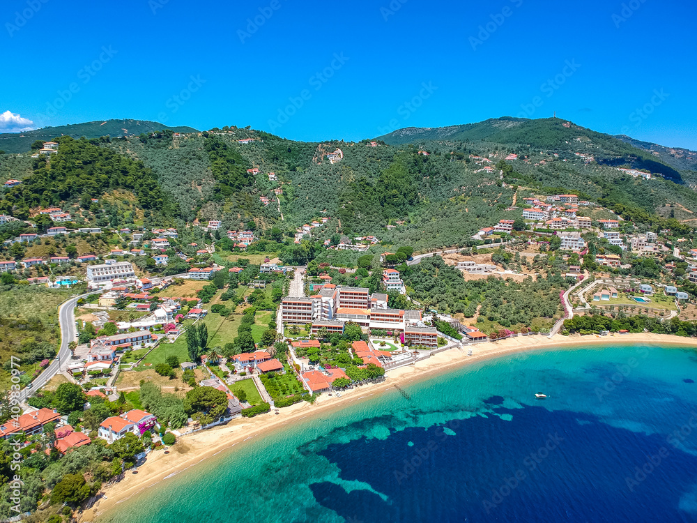 Aerial view over southern skiathos island, Greece with modern hotels and luxurious villas in Sporades, Greece,