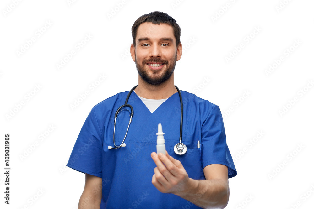 healthcare, profession and medicine concept - happy smiling doctor or male nurse in blue uniform with nasal spray and stethoscope over white background healthcare, profession and medicine concept - happy smiling doctor or male nurse in blue uniform with nasal spray and stethoscope over white background