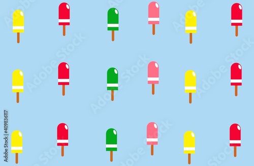 Colorful bitten popsicles on light blue background. Background, texture. Copy space