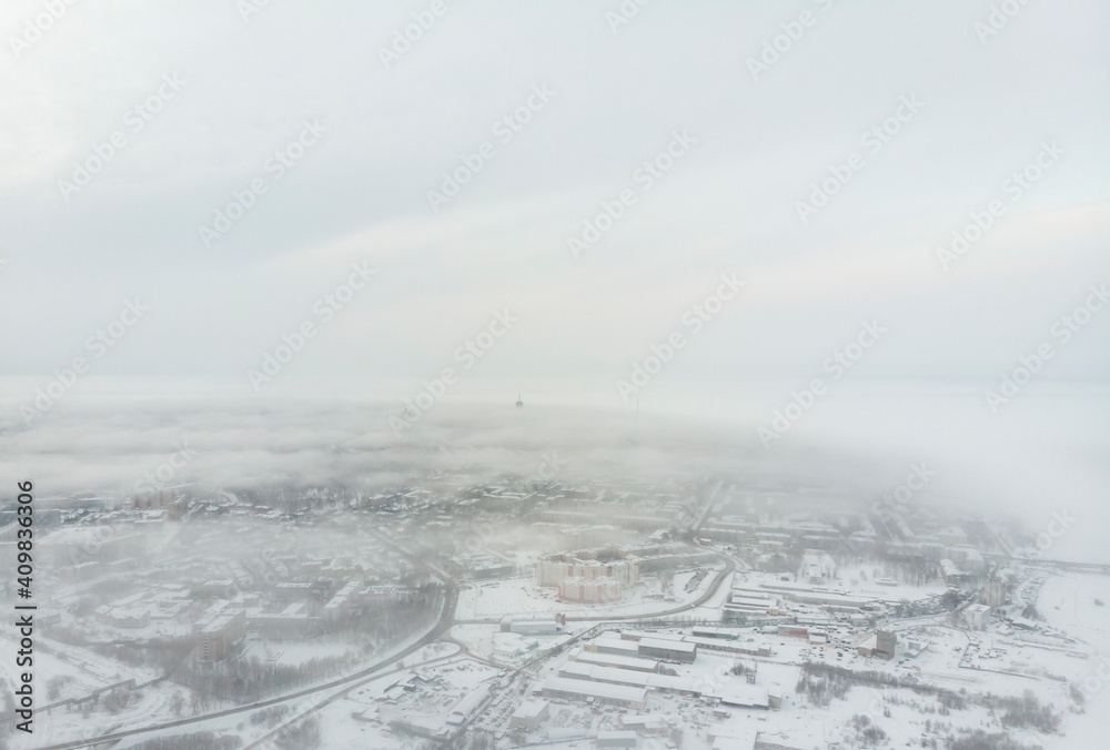 City view in fog. Winter in Arkhangelsk 