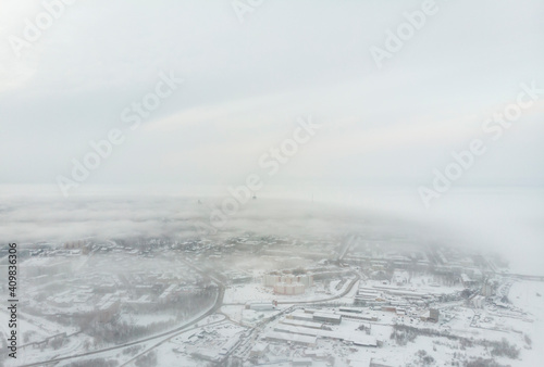 City view in fog. Winter in Arkhangelsk 