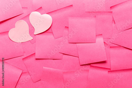 Sticky note post it in pink color as background