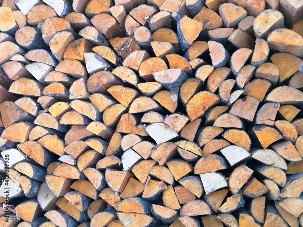 firewood, winter day in a Russian village trees in the snow frost firewood, winter day in a Russian village trees in the snow frost