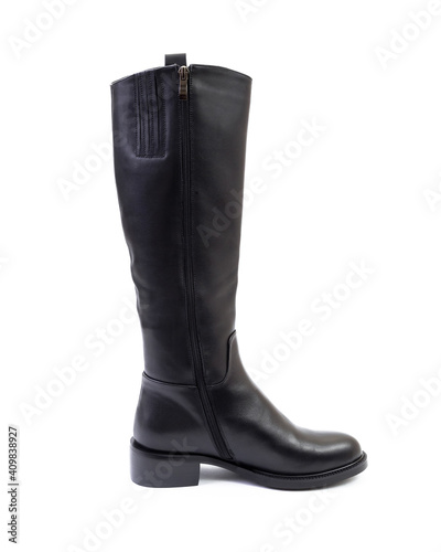 Single high black leather women’s boot isolated on white background, side view. Fashion and shopping concept