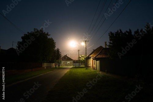 Night street in the village, full moon