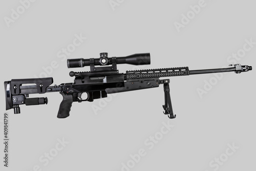 Fotografía rifle in black on a light gray background