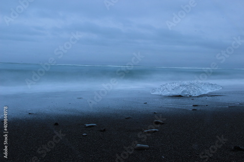Black sand beach with ice blocks © Mischa