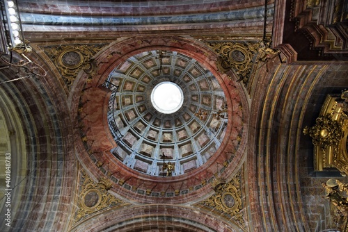 The multicolored, coffered dome of the church at Monastery of San Martiño Pinario in Santiago de Compostela, Spain  photo