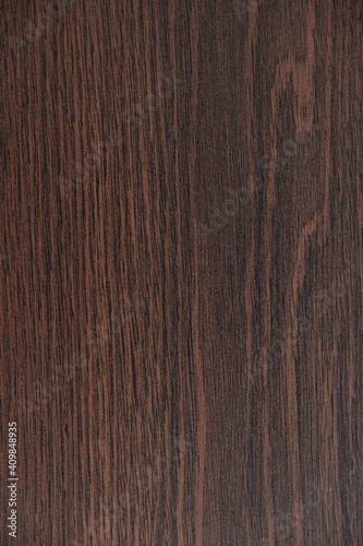 Texture of brown oak wood as a background. Top view. Copy, empty space for text
