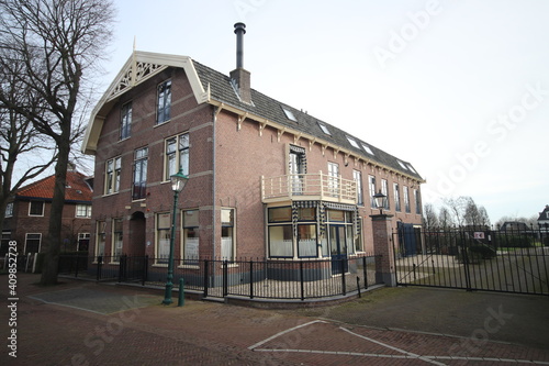 Old houses and buildings in the village center of Warmond South Holland photo