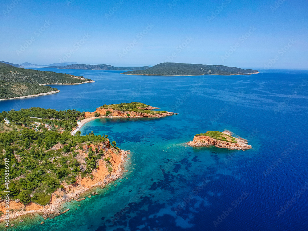 Aerial drone view over Chrisi Milia beach and the rocky surrounded area in Alonnisos island, Sporades, Greece