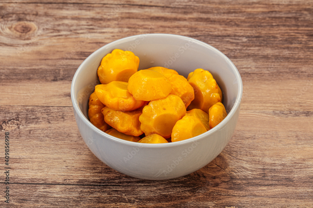 Marinated yellow patisson in the bowl Marinated yellow patisson in the bowl