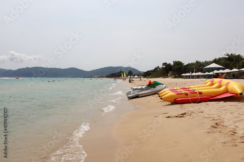 Banana shaped inflatable boat moored on the beach, Sanya City, Hainan Province, China