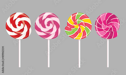 A set of isolated multi-colored lollipops with a spiral pattern. Vector flat illustration.