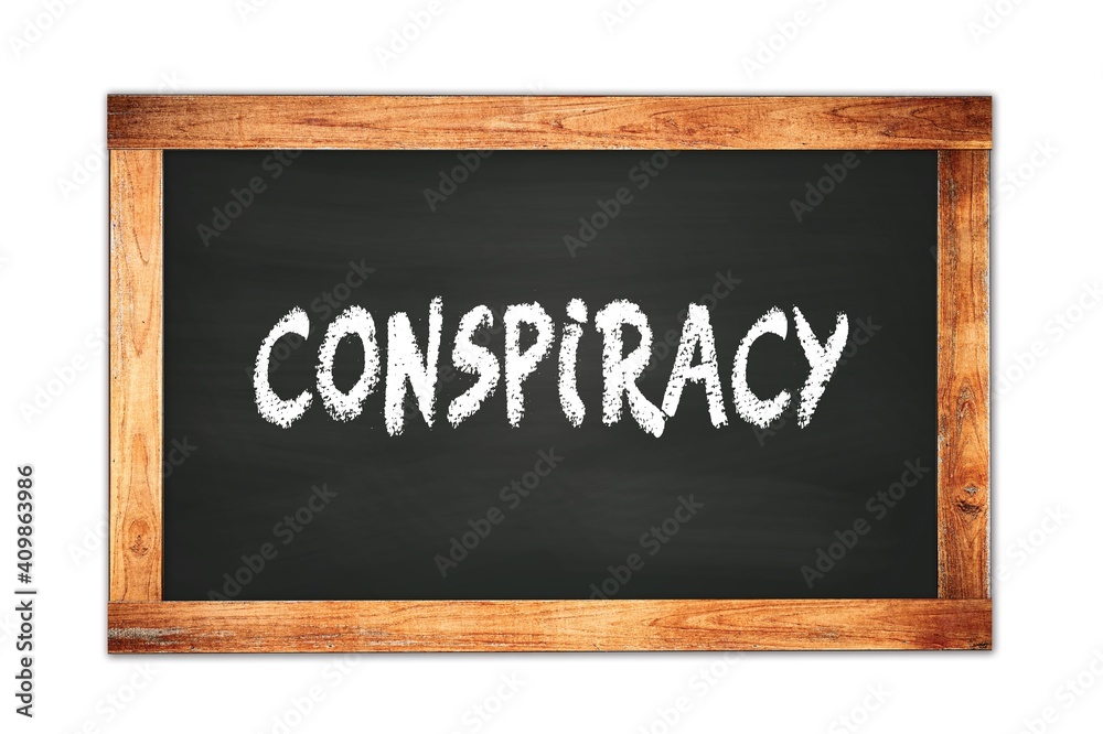 Fototapeta premium CONSPIRACY text written on wooden frame school blackboard.