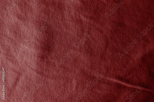 Dark red cotton texture. Red background
