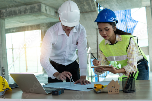 Group of engineers and architectures planning and checking building interior design in construction site, team and teamwork working concept © khwanchai