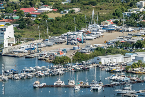 Scenic view of the caribbean island of St.maarten. Caribbean island citycsape. Simpson bay lagoon  located in the Caribbean island of St Maarten.  © Multiverse
