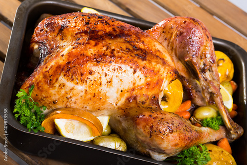 Baked turkey. Rub turkey with salt, pepper, provencal herbs, honey and balsamic. Cover with foil and cook in oven for 2 hours at 180 g. Remove foil, put apples, vegetables and cook for 40 minutes.