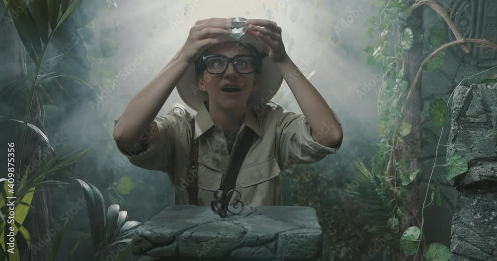 Explorer finding a precious treasure in the jungle